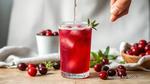 Mixing Cranberry Sparkling Drink Delight