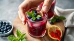 Mixing Blueberries for Refreshing Summer Drink